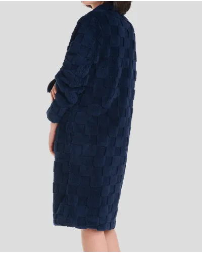 Woman in navy checkered jacquard winter long coat