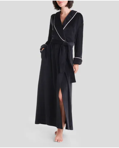 Woman in long winter gown with black dinner jacket collar and piping