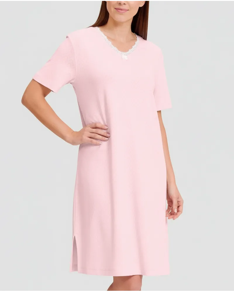 Woman in pink short sleeve lingerie nightdress
