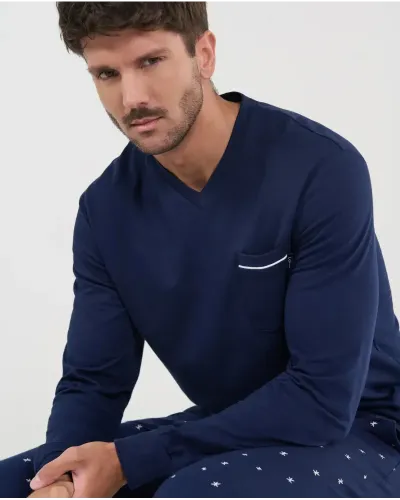 Front view of men's navy winter pajama set with v-neck top and star print pants, perfect for cozy nights.