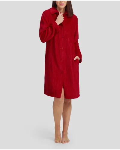 Woman in red jacquard buttoned long winter dressing gown with long buttoned pockets