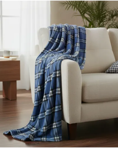 Checkered patterned sofa blanket for the home.