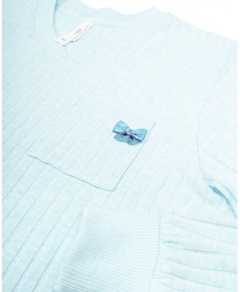 Detalle tejido canalé azul chaquetilla pijama mujer invierno