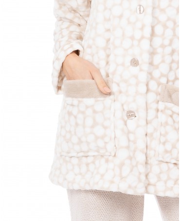 Detail of women's flannel short dressing gown with polka dots print