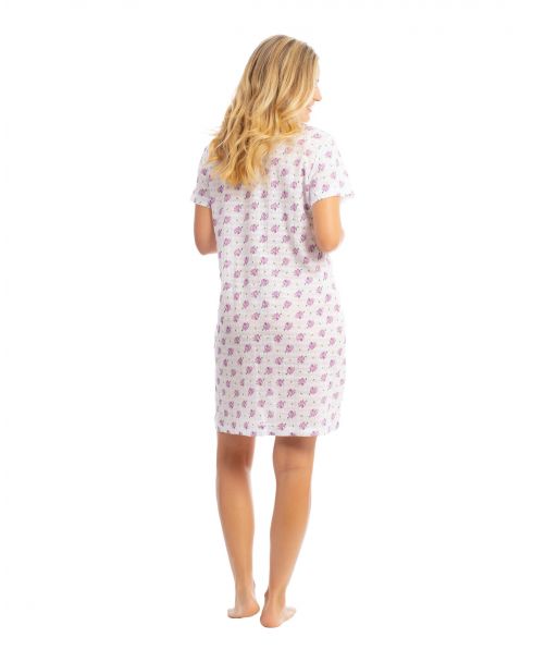 Young girl in cool summer nightgown in cotton with lilac flowers print