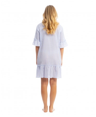 Woman wears a short cotton dress very cool and comfortable