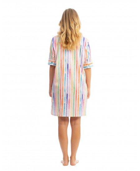 Woman wears flattering vertical striped dress to the beach