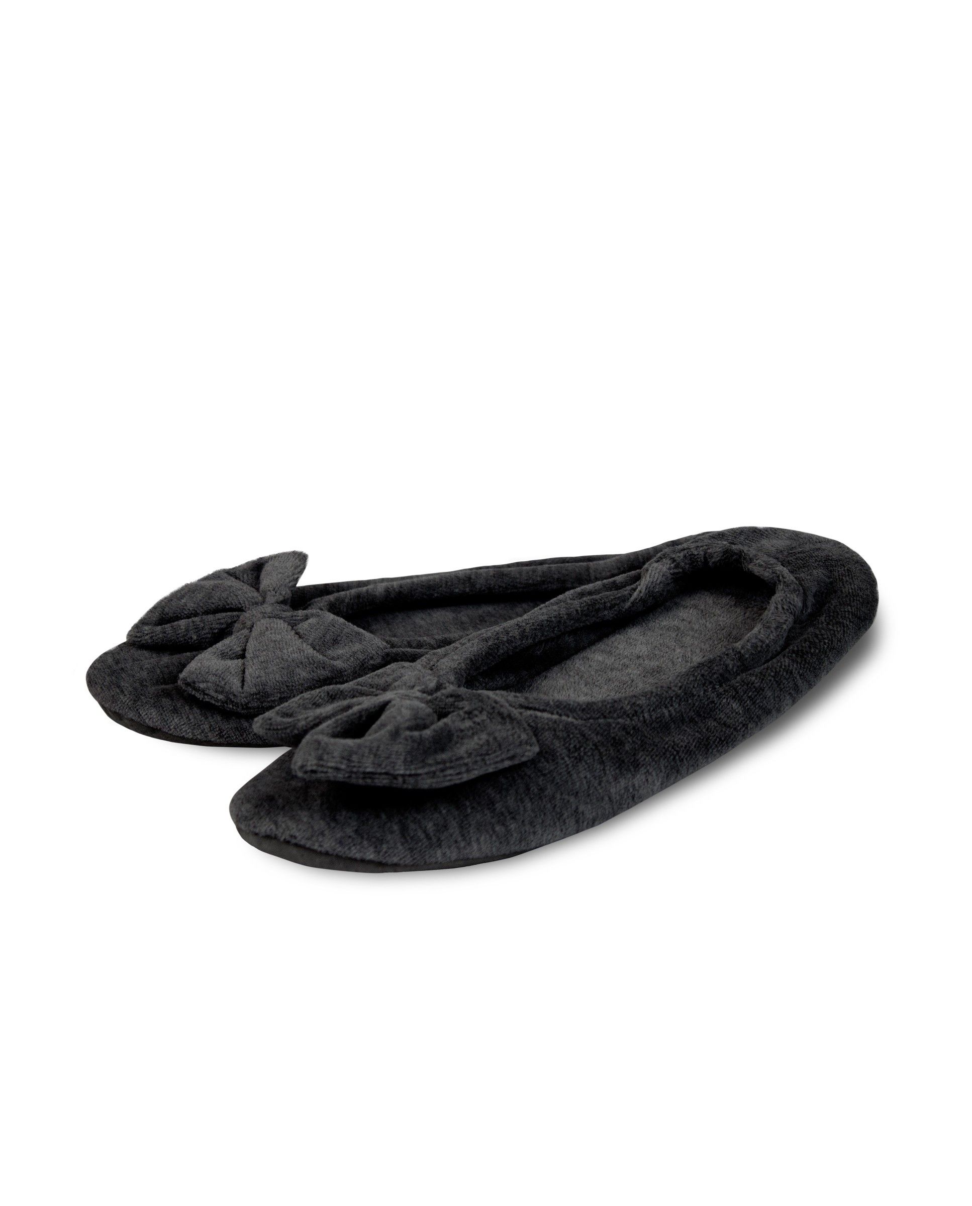 A pair of black velvet slippers on a white background
