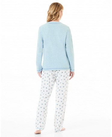 Back view of a woman wearing winter pyjamas with light blue long-sleeved jacket and plain trousers with leaf print.