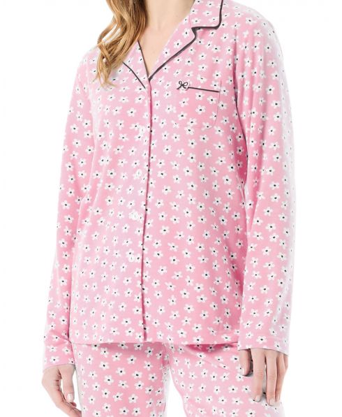 Detail of women's winter pyjama jacket open with pink daisies print