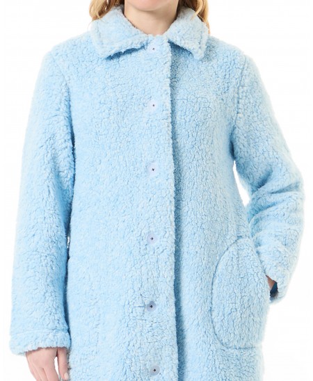 Detail of the light blue buttoned sheepskin long coat with pockets for women for the winter season