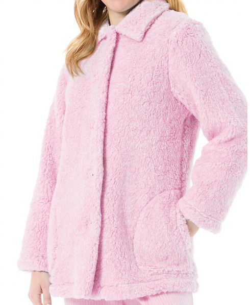 Detail of the pink buttoned sheepskin coat for women with side pockets