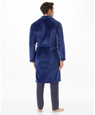 Rear view man in a long blue knotted dressing gown