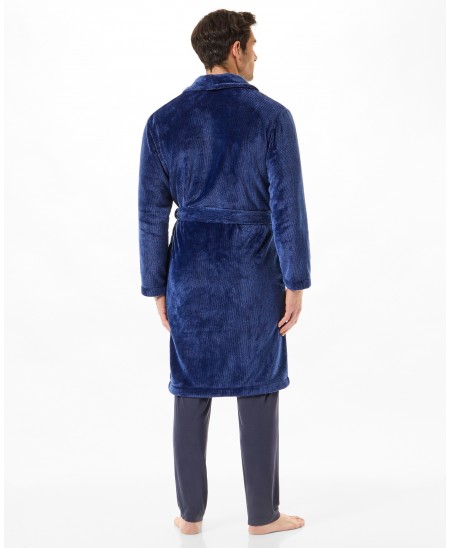 Rear view man in a long blue knotted dressing gown