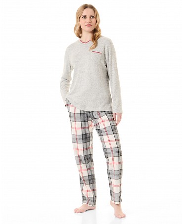 Woman in mixed checked winter pyjamas