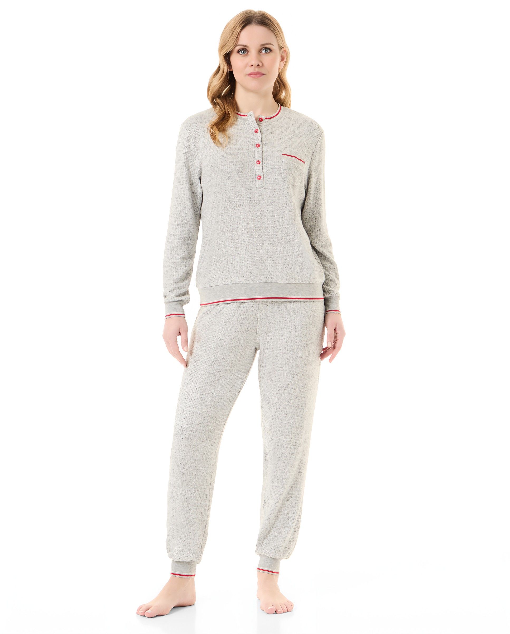 Women's long winter pyjamas with long-sleeved plain jacket, round neck with buttons, plain long trousers with cuffs.