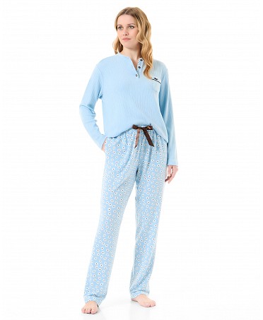 Woman in light blue mixed daisy winter pyjamas