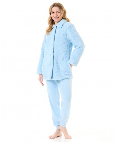 Woman in light blue melange sheepskin short winter coat