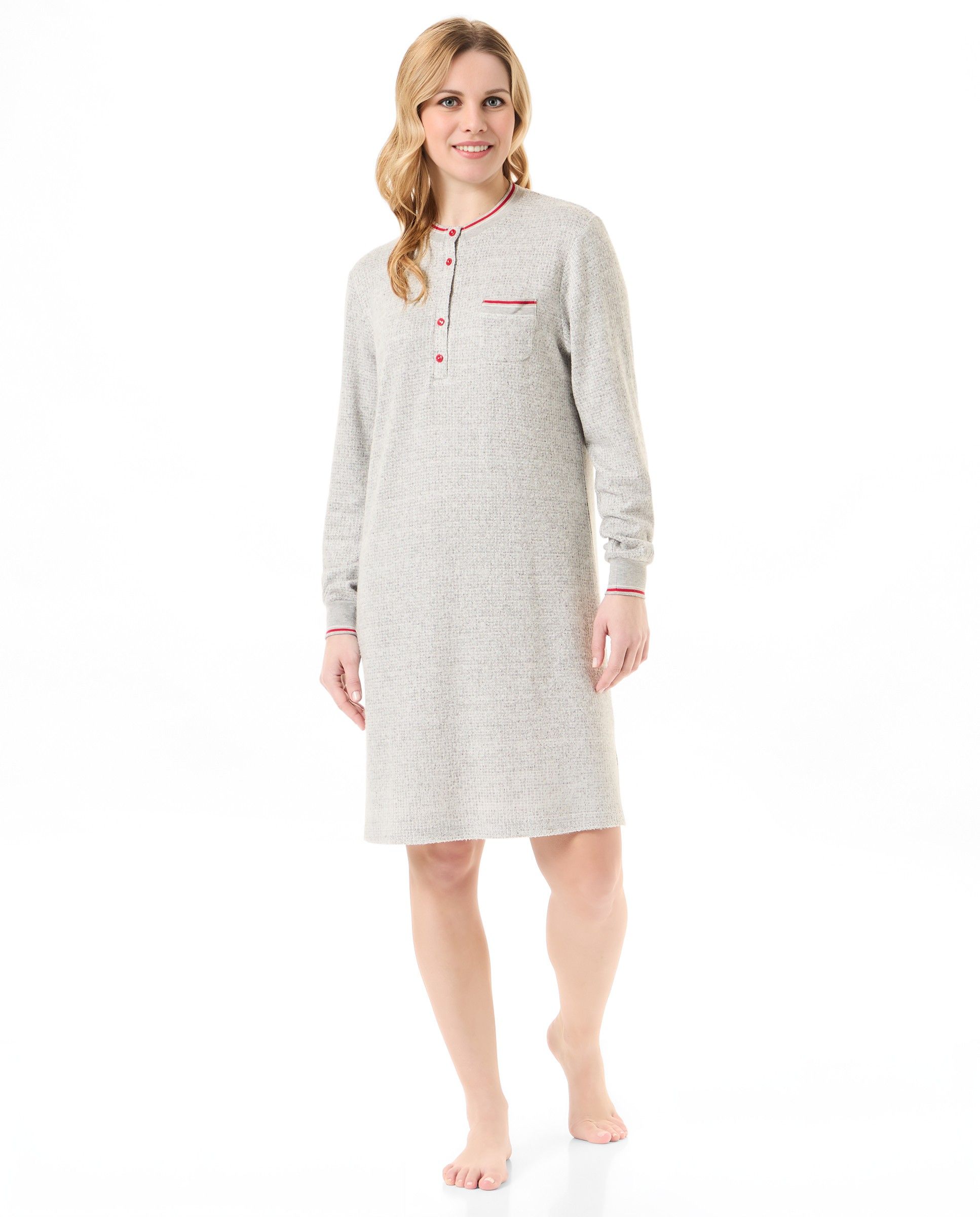 Woman in plain nightdress, round neck with buttons, long sleeves with cuffs.