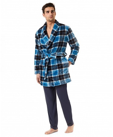 A man dressed in a short navy and blue checked dressing gown.