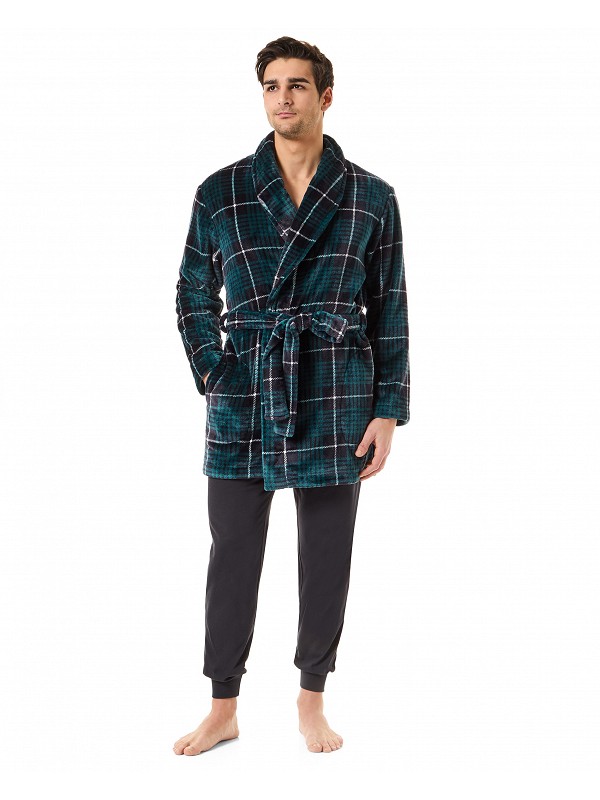 A man dressed in a short green and blue checked dressing gown