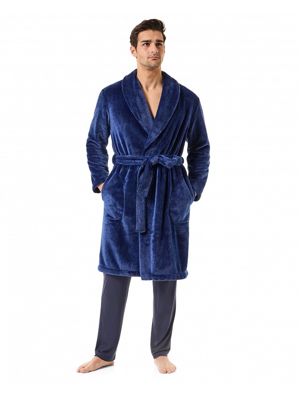 A man wearing a long blue knotted dinner jacket dressing gown