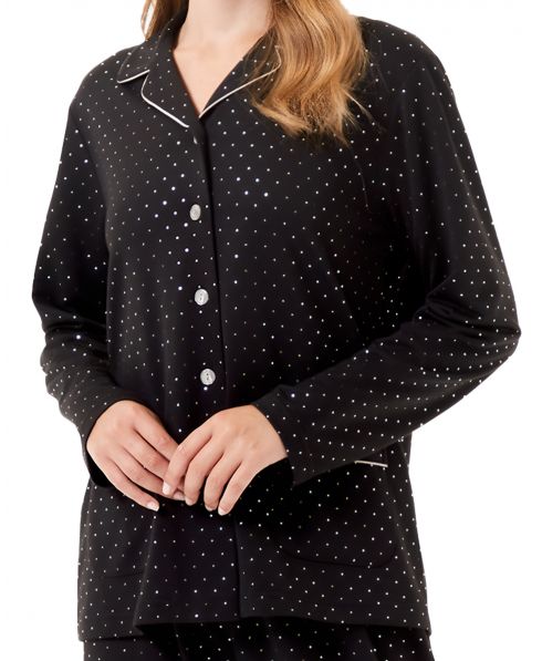 Vista detalle de chaquetilla pijama negro de corte camisero con bolsillos y estampado de puntos y vivo color plata