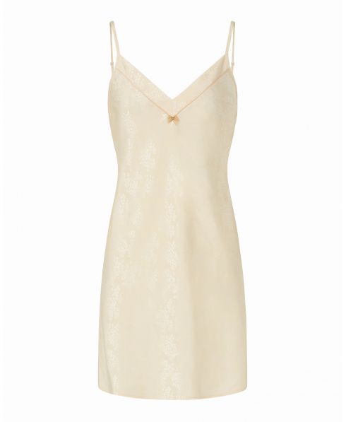 Women's short nightdress, champagne-coloured jacquard fabric, thin straps, V-neck, piping with bow decoration.