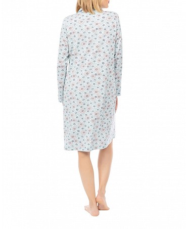 Woman with open short nightdress with flower buttons
