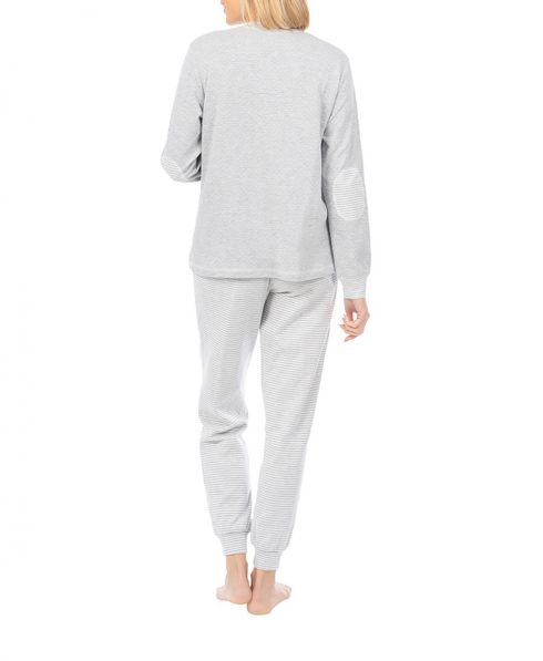 Woman with long grey striped winter pyjamas