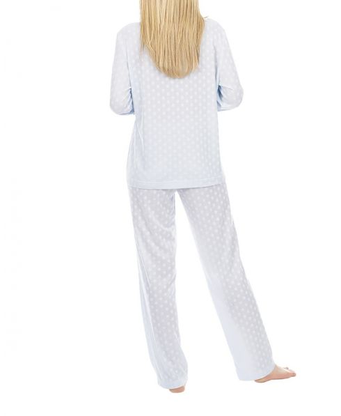 Woman in two-piece pyjamas circles