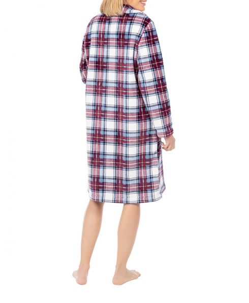 Woman in long winter dressing gown with buttons in flannel checked fabric