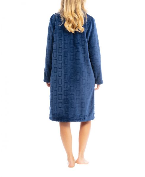 Woman in long-sleeved plaid buttoned dressing gown with long sleeves