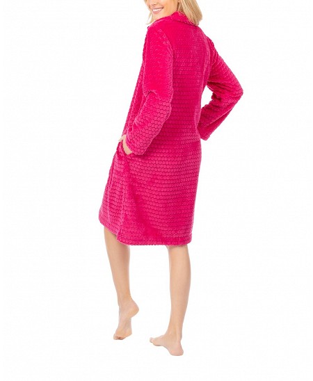 Woman with long winter dressing gown with fuchsia buttons