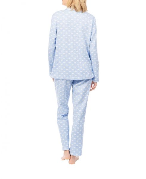 Rear view of a woman in light blue shirt pyjamas