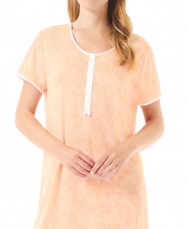 Detail view of summer nightgown with round neck with buttons and short sleeves in orange tone.