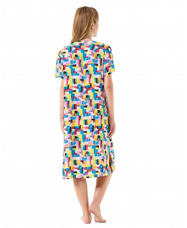Back view of a woman in a short-sleeved multicoloured beach dress