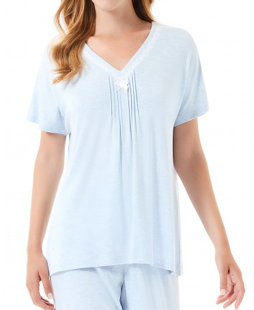 Detail view of light blue short sleeve summer pajamas with v-neck and lace trim
