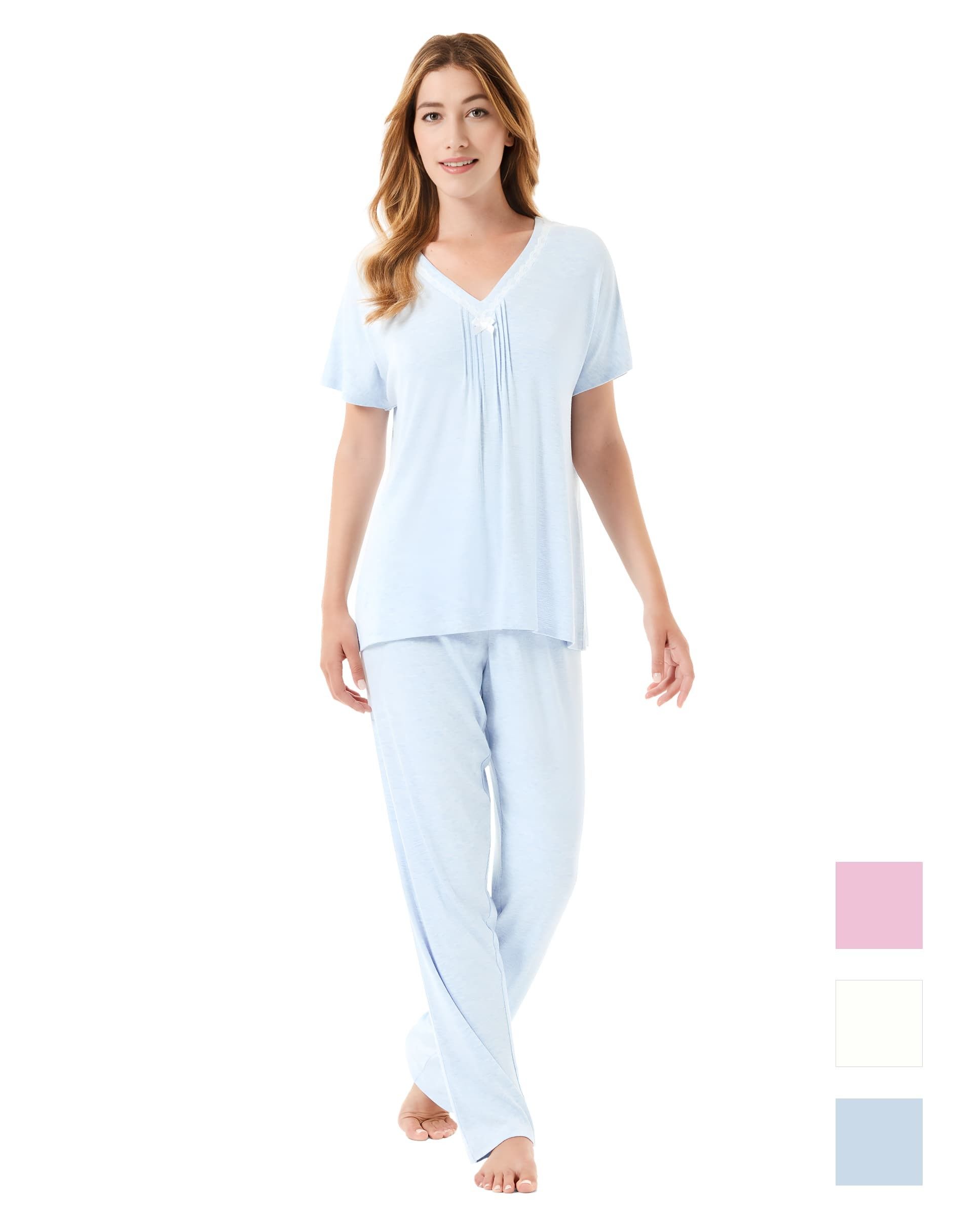 Woman in light blue summer long pajamas with decorative lace collar