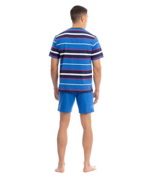 Rear view of a man in blue striped summer pyjama shorts