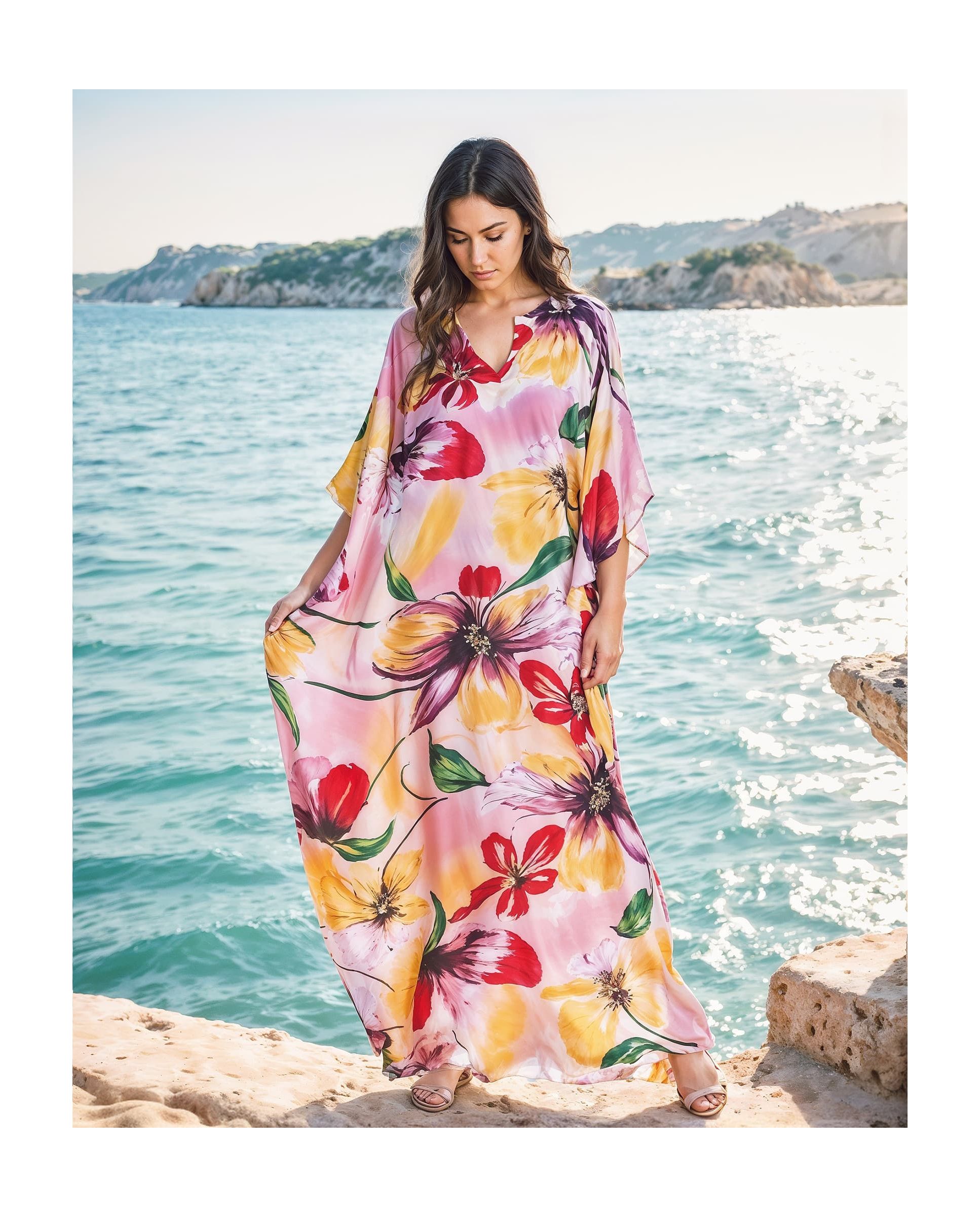 Woman with natural silk kaftan with flowers in pink tones