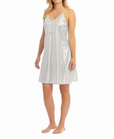 Woman wears ivory satin summer nightgown with straps