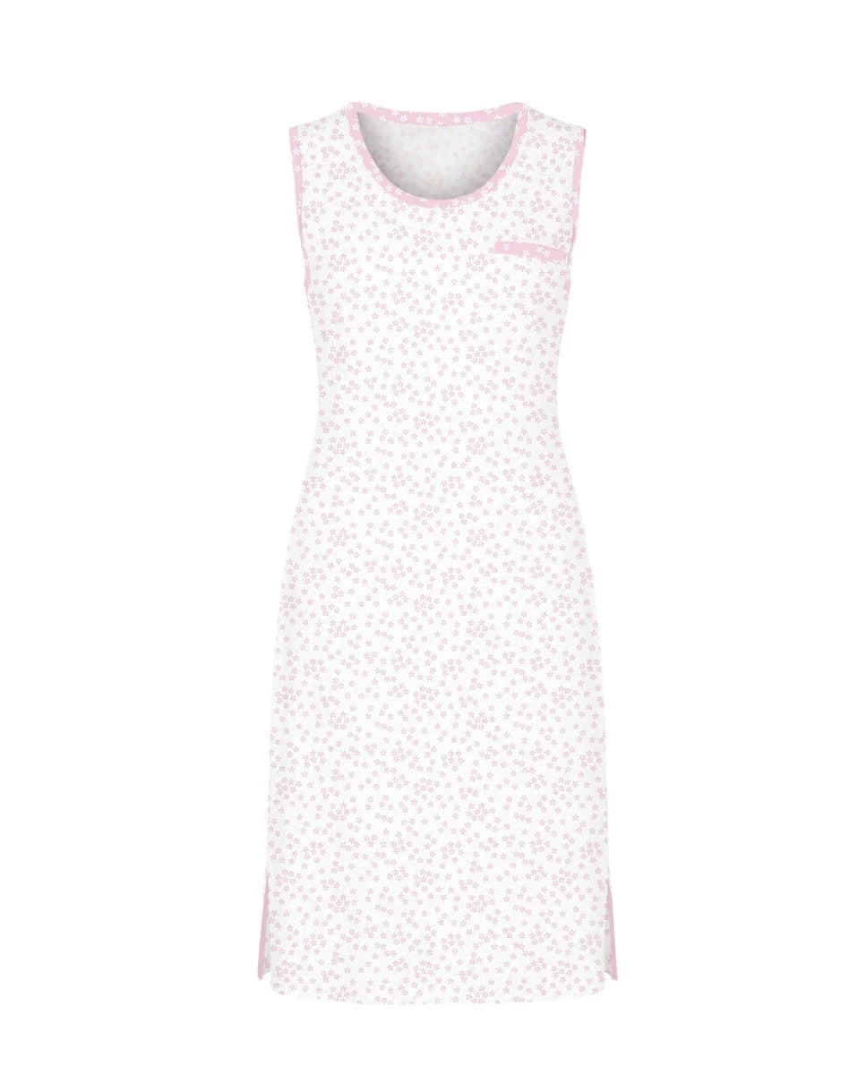 Camisón corto de mujer sin mangas tejido de punto blanco con estampado de florecitas rosas y escote redondo con contraste y bolsillo decorativo.