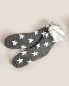 Calcetín de invierno gris estrellas