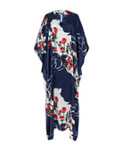 Kaftan de seda natural estampado con escote redondo y abertura central con manga mariposa al codo.