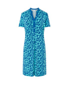 Vestido de baño corto de manga corta en punto azul con estampado ondas, cuello abierto con pata y bolsillos laterales