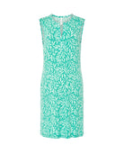 Vestido de baño de mujer corto sin mangas en punto estampado de hojas blancas con cuello pico y bolsillos laterales.